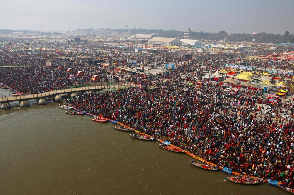 Pilgrims gather at the confluence of the Ganges, Yamuna and mythical Saraswati rivers in Prayagraj on January 29, 2025. (Photo by Niharika Kulkarni / AFP)