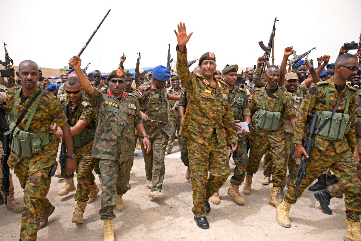 (FILES) Sudanese army chief Abdel Fattah al-Burhan visits the Flamingo Marine Base in Port Sudan on August 28, 2023. (Photo by AFP)
