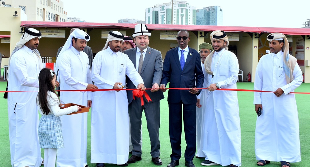 Managing Director of the Private Engineering Office, Nasser Rashid Al Nuaimi (third left), Ambassador of the Kyrgyz Republic H E Marat Nuraliev (centre), Ambassador of Djibouti H E Dayib Doubad Robleh (third right), and other officials inaugurating the International Honey Exhibition at Souq Waqif. 