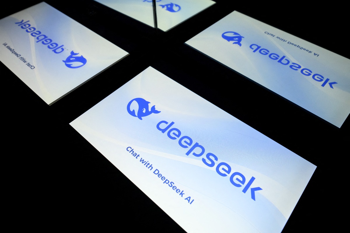 This photograph shows screens displaying the logo of DeepSeek, a Chinese artificial intelligence company which develops open-source large language models, in Toulouse, southwestern France on January 29, 2025. Photo by Lionel BONAVENTURE / AFP