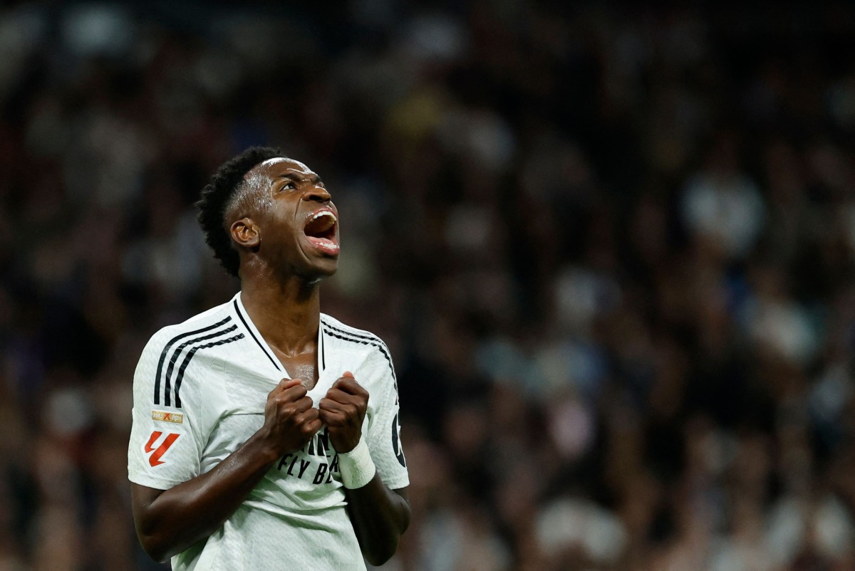 File: Real Madrid's Brazilian forward Vinicius Junior during the Spanish league football match between Real Madrid CF and FC Barcelona at the Santiago Bernabeu stadium in Madrid on October 26, 2024. (Photo by Oscar Del Pozo / AFP)

