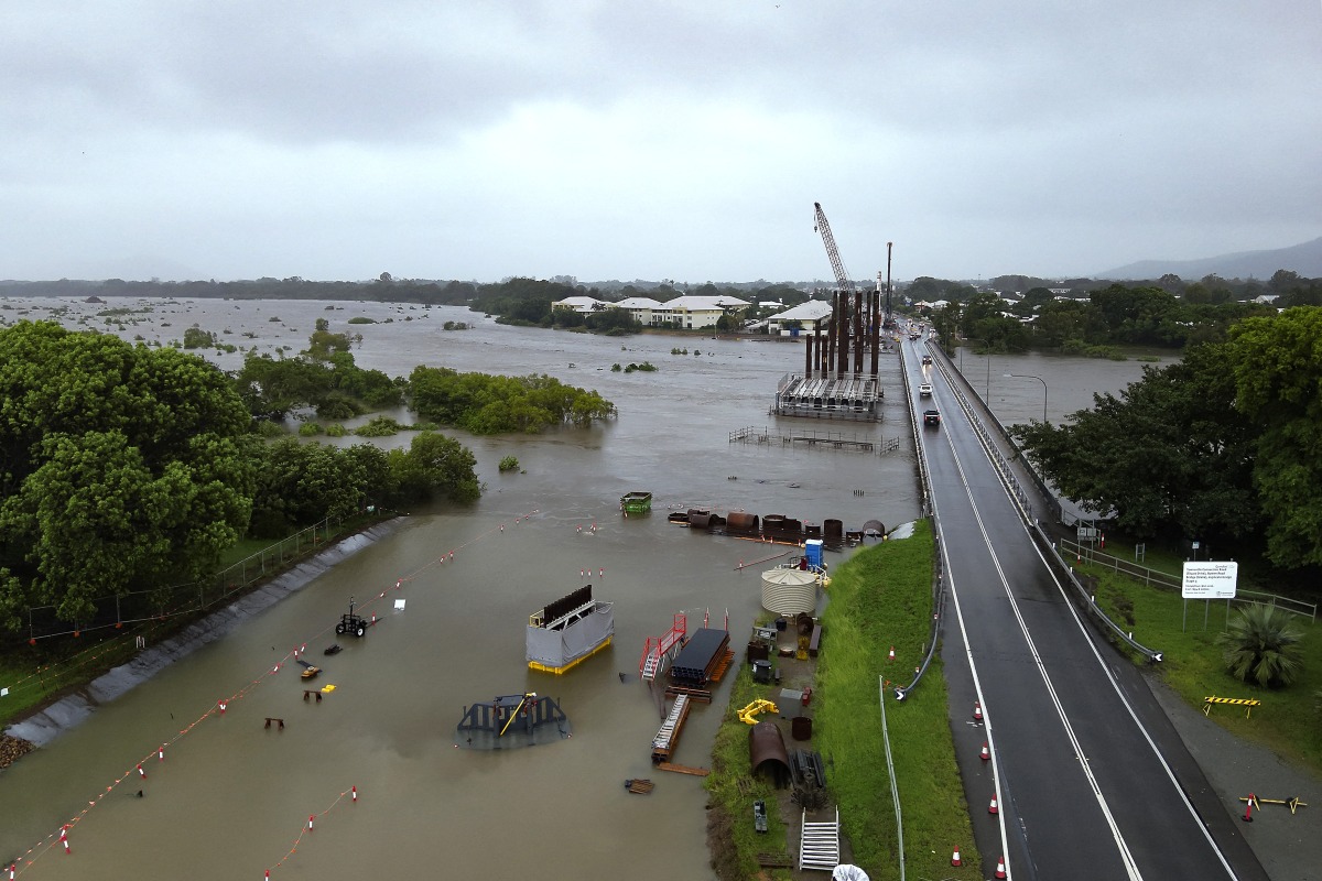 A handout photo taken on February 2, 2025 and released by the Queensland Fire Department on February 3, 2025 shows an aerial view of flood-affected areas around Townsville, Queensland. (Photo by Handout / Queensland Fire Department / AFP)