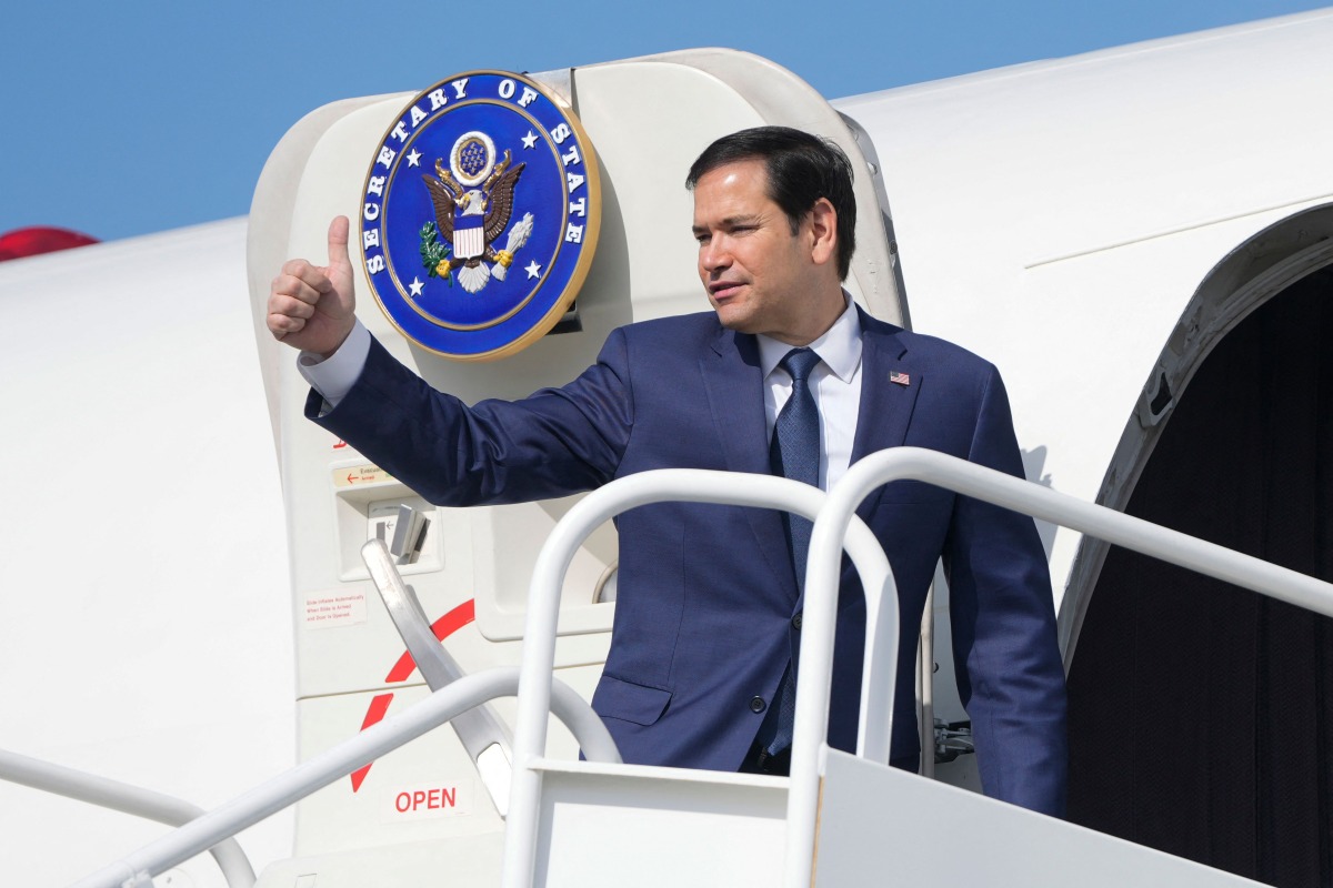 US Secretary of State Marco Rubio boards a plane en route to El Salvador at Panama Pacifico International Airport in Panama City on February 3, 2025. (Photo by Mark Schiefelbein / Pool AP / AFP)
