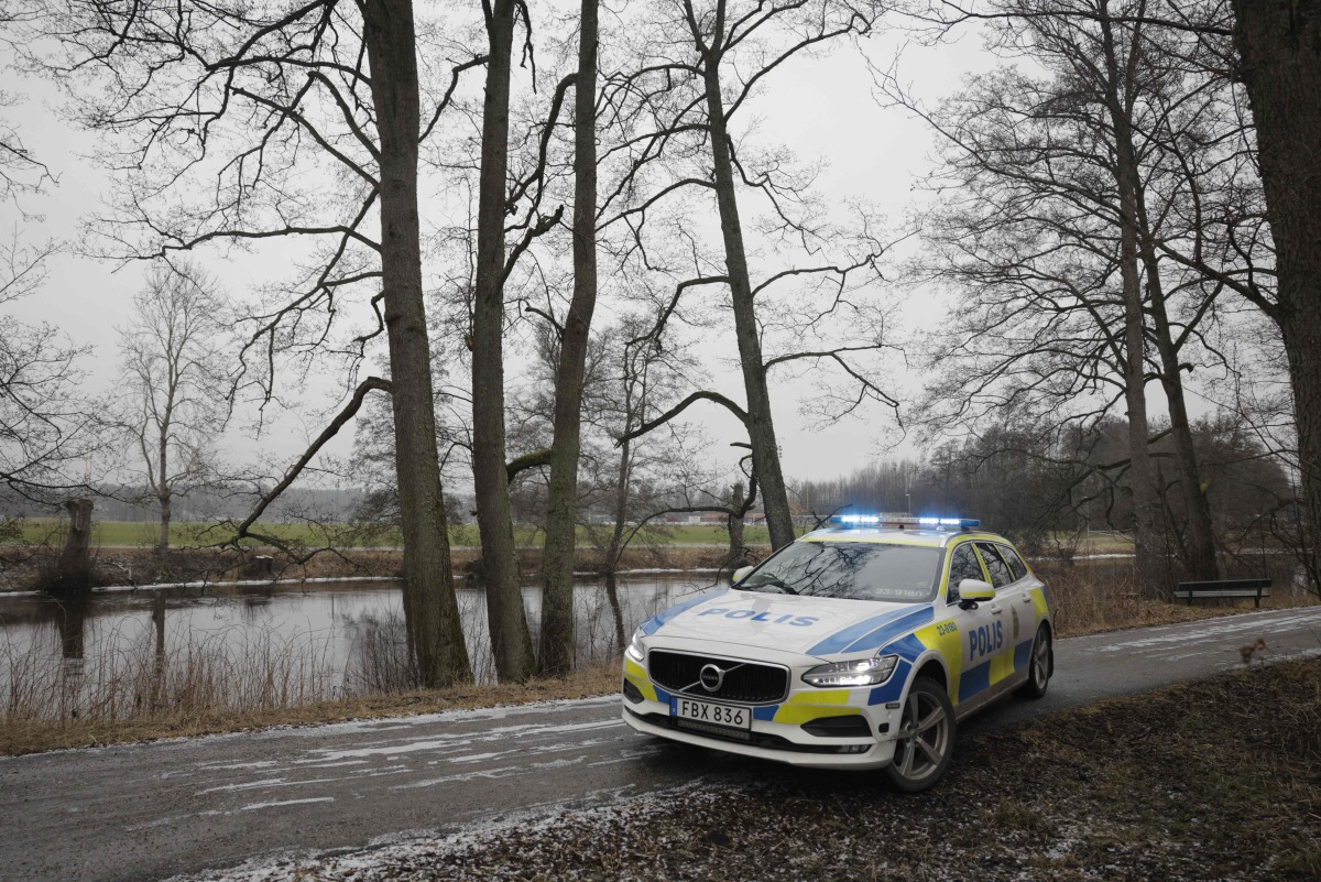 A police vehicle is seen near the Risbergska School in Orebro, Sweden, on February 4, 2025, following reports of a serious violent crime. Photo by Kicki NILSSON / TT NEWS AGENCY / AFP