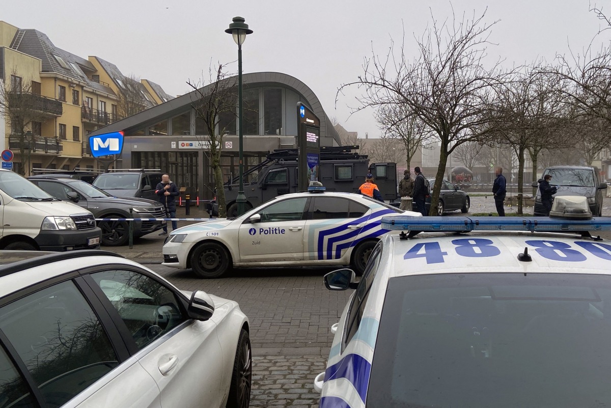 Police officers stand guard outside the Clemenceau metro station following a shooting, in Brussels on February 5, 2025. Photo by RACHELLE DUFOUR / Belga / AFP