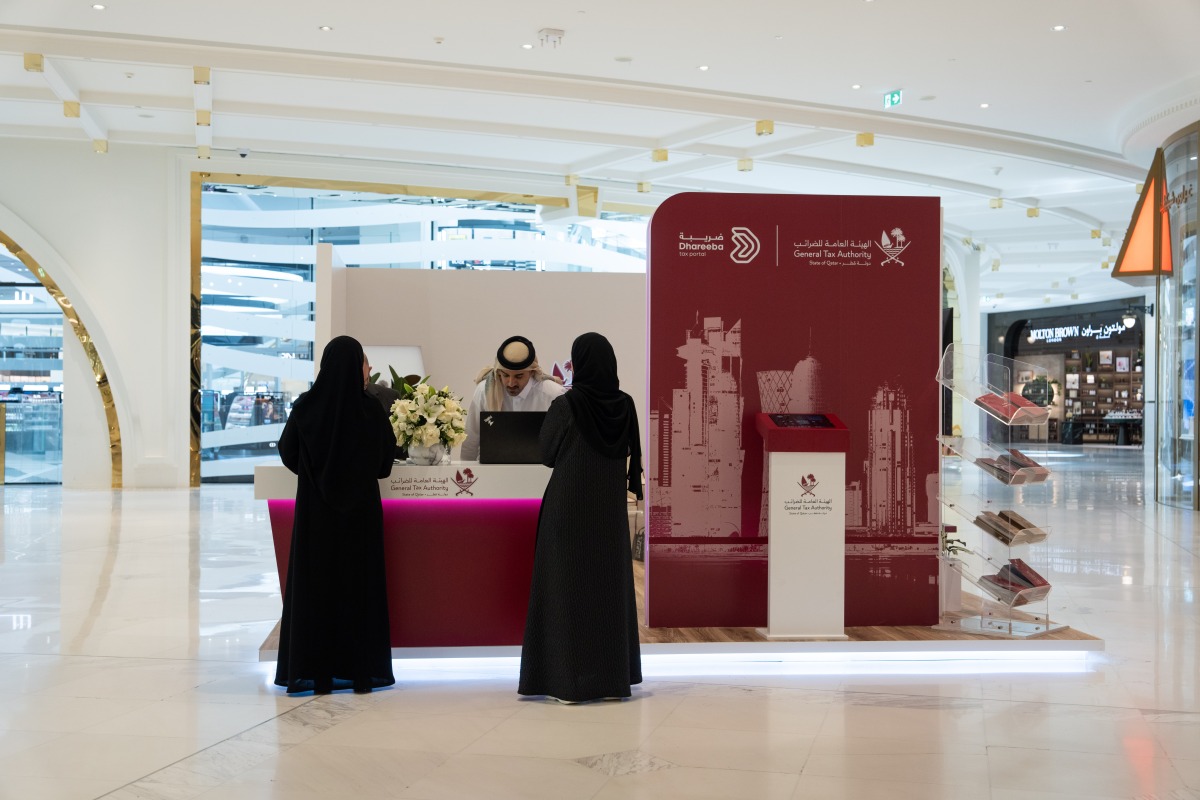 People seen at a booth in a shopping center as part of GTA's initiative.