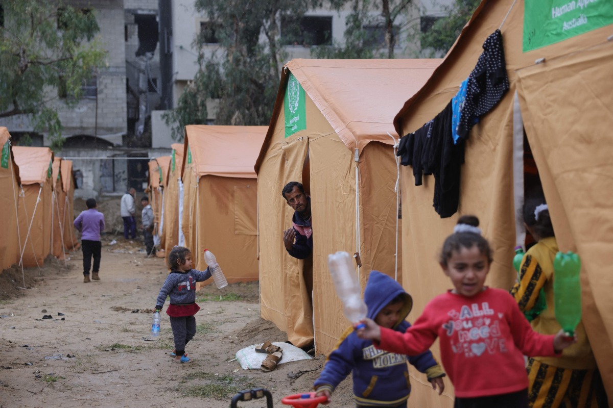 Displaced Palestinian families take refuge in tents installed near their damaged homes in Jabalia in the northern Gaza Strip on February 6, 2025. Photo by Bashar TALEB / AFP