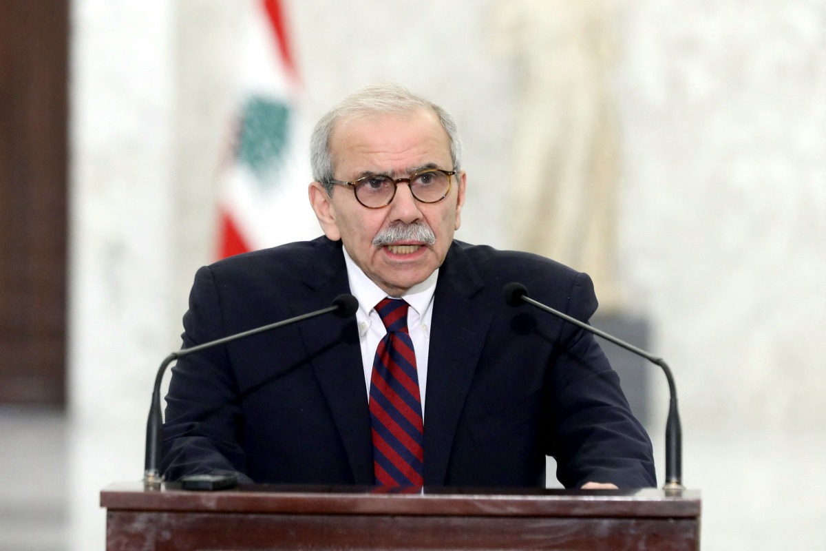 This handout picture released by the Lebanese presidency shows designate Prime Minister Nawaf Salam delivering a statement to the press at the presidential palace in Baabda, east of Beirut on February 8, 2025. (Photo by Lebanese Presidency / AFP)