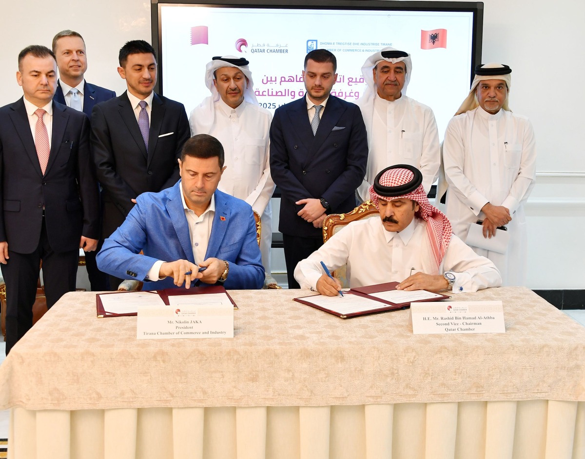 Deputy Minister for Europe and Foreign Affairs of the Republic of Albania, H E Endrit Yzeiraj, witnessing the MoU signing between Second Vice Chairman, of Qatar Chamber, Rashid bin Hamad Al Athba and President of the Tirana Chamber of Commerce and Industry, Nikolin Jaka.