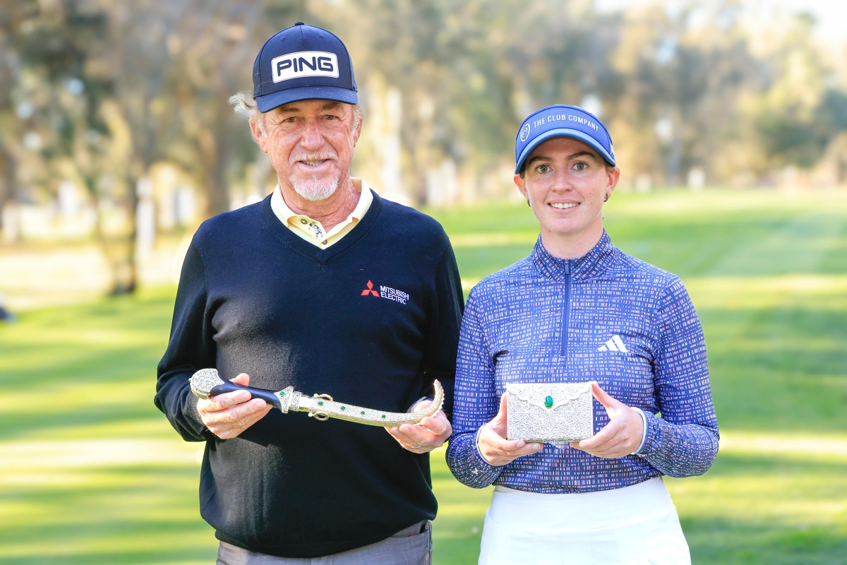 Hassan II Golf Trophy winner Miguel Angel Jimenez of Spain and Lalla Meryem Cup champion Cara Gainer of England pose with their trophies.