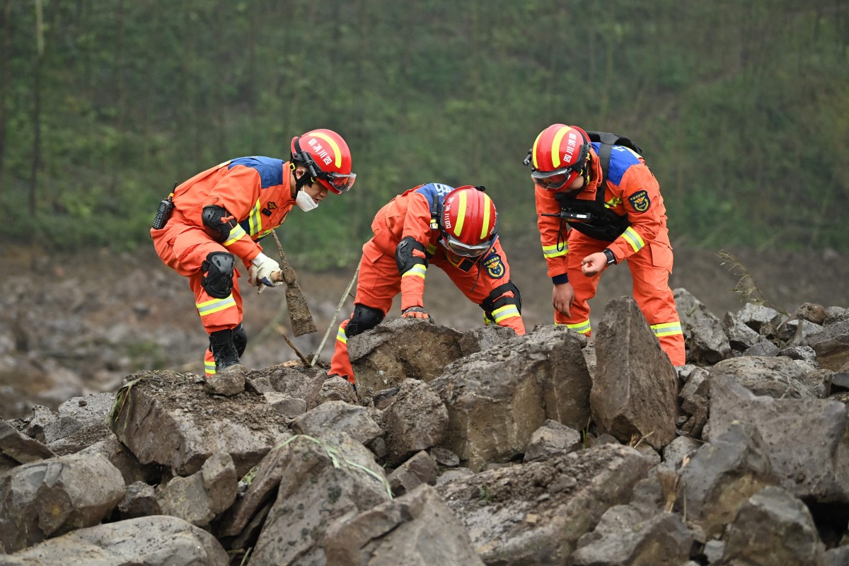 Rescuers work at the site of a landslide in Jinping village in the city of Yibin, in China's southwest Sichuan province on February 9, 2025. Photo by CNS / AFP