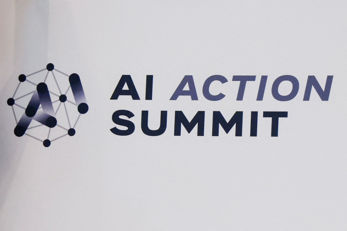 This photograph shows the logo of the Artificial Intelligence (AI) Action Summit, at the Grand Palais, in Paris, on February 10, 2025. (Photo by Ludovic MARIN / AFP)