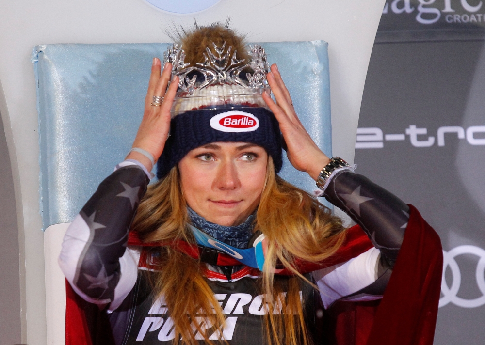 Mikaela Shiffrin of the U.S. celebrates with a crown after winning the Women's Slalom REUTERS/Borut Zivulovic