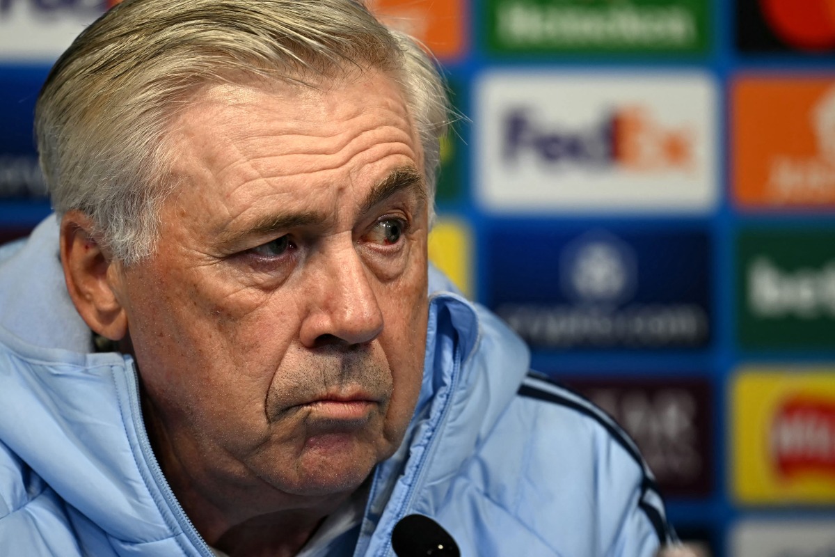 Real Madrid's Italian coach Carlo Ancelotti looks on during a press conference at the Etihad Stadium in Manchester, north-west England on February 10, 2025, on the eve of their UEFA Champions League football match against Manchester City. (Photo by Paul ELLIS / AFP)
