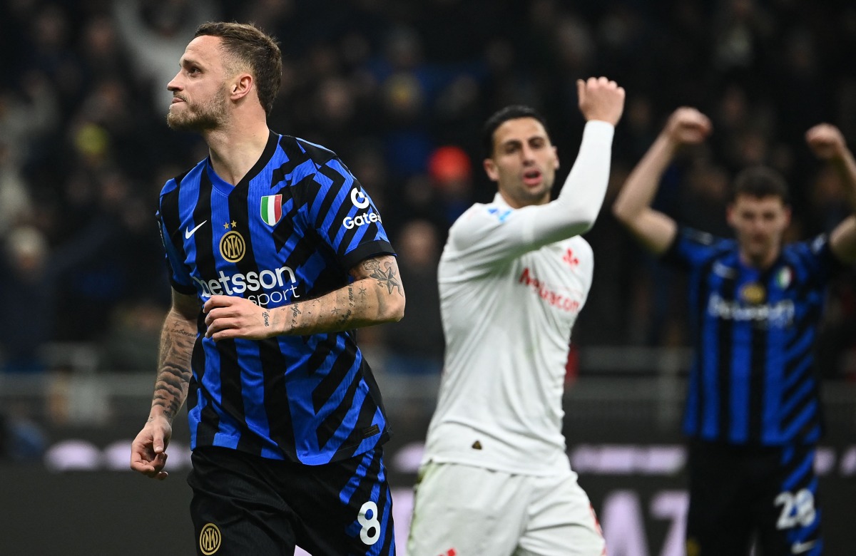 Inter Milan's Austrian forward #08 Marko Arnautovic celebrates after scoring a goal during the Italian Serie A football match between Inter Milan and Fiorentina at San Siro stadium in Milan on February 10, 2025. (Photo by Isabella BONOTTO / AFP)
