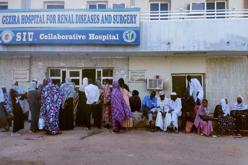 People seek medical care at a hospital in Wad Madani, which was retaken by the Sudanese army a month earlier, in Sudan's al-Jazira state on February 11, 2025. (Photo by AFP)