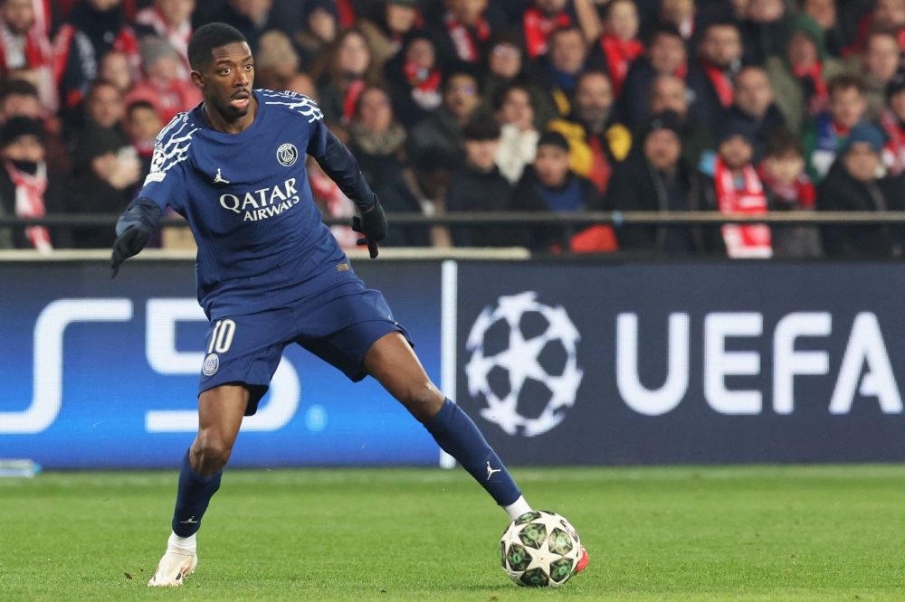 Paris Saint-Germain's French forward #10 Ousmane Dembele controls the ball during the UEFA Champions League knockout phase play-off 1st leg football match between Stade Brestois 29 (Brest) and Paris Saint-Germain (PSG) at the Roudourou Stadium in Guingamp, western France, on February 11, 2025. (Photo by Fred Tanneau / AFP)