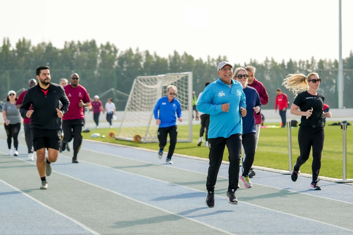 UDST President Dr. Salem Al Naemi and others in action to mark the National Sport Day yesterday. 