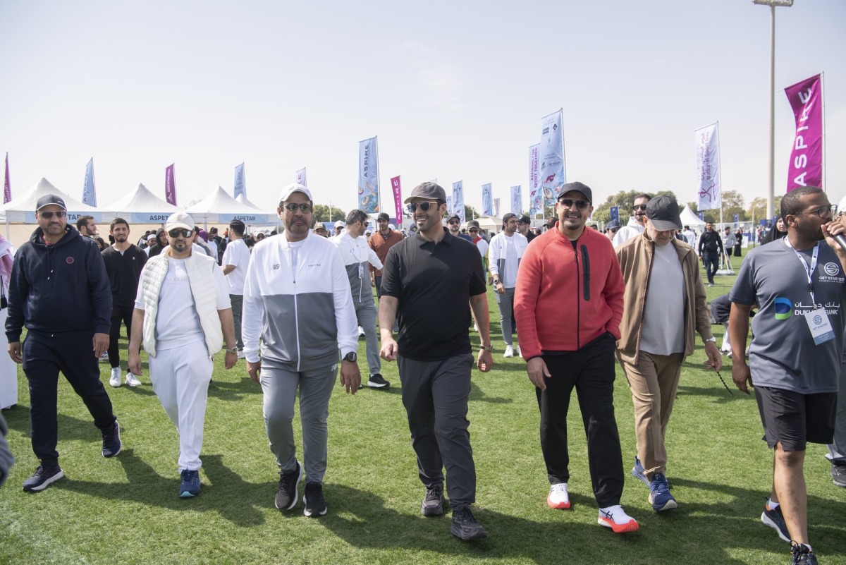 Minister of Municipality H E Abdullah bin Hamad bin Abdullah Al Attiyah (centre) and other officials during National Sport Day activities at Aspire Park yesterday. 