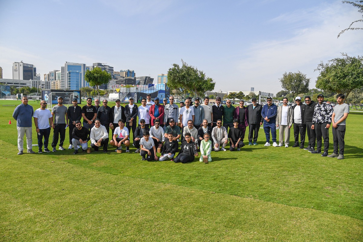 Chairman of the General Authority of Customs H E Ahmed bin Abdullah Al Jamal with officials and employees during National Sport Day activities yesterday. 