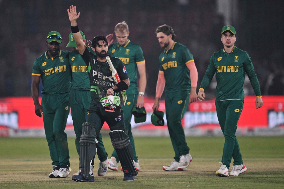 Pakistan's Mohammad Rizwan (C) celebrates after winning the Tri-Nation series third one-day international (ODI) cricket match between Pakistan and South Africa at the National Stadium in Karachi on February 12, 2025. (Photo by Asif HASSAN / AFP)
