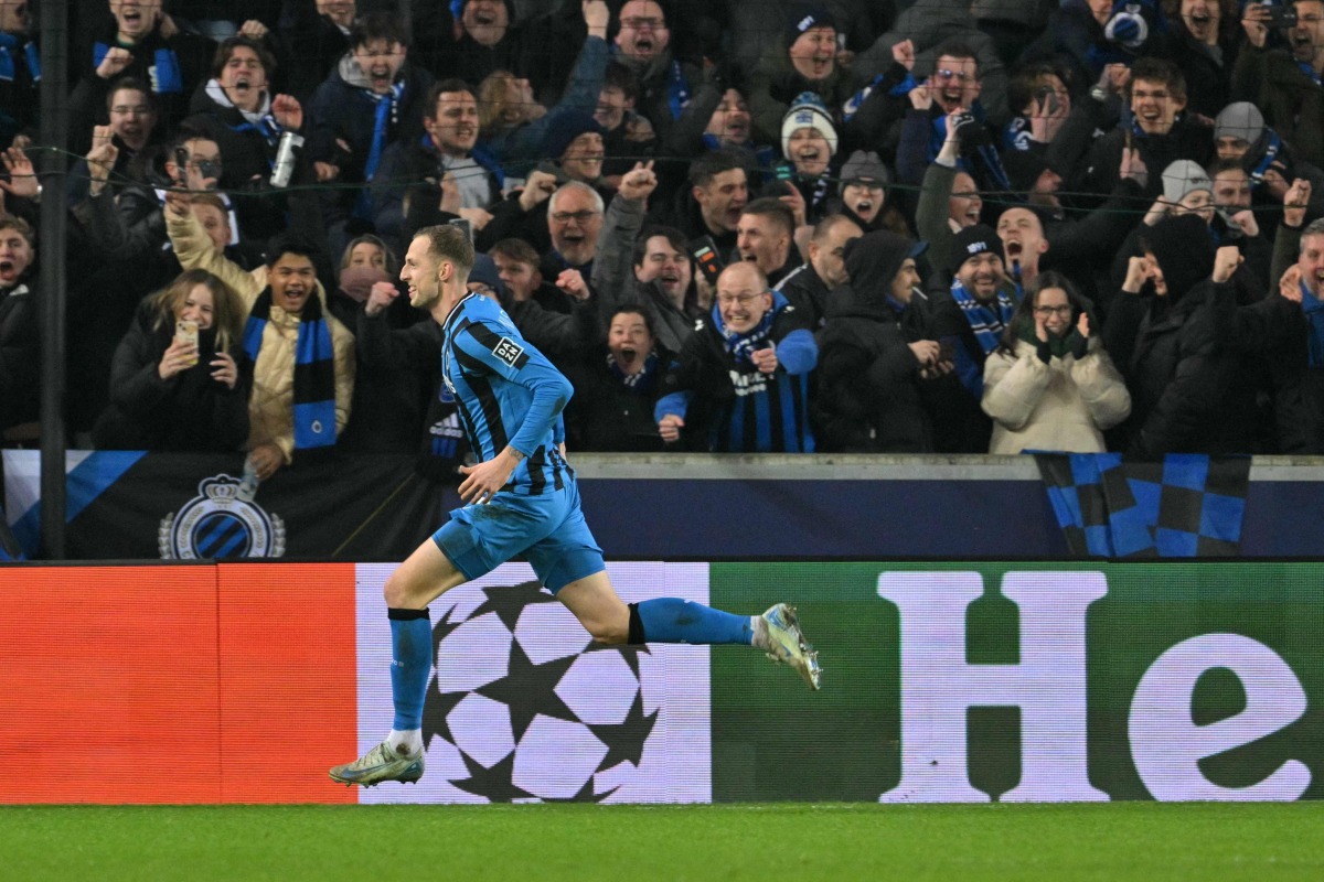 Club Brugge's Swedish forward #19 Gustaf Nilsson celebrates scoring his team's second goal during the UEFA Champions League knockout phase play-off 1st leg football match between Club Brugge KV and Atalanta at the Jan-Breydel stadium in Sint-Andries, Bruges, on February 12, 2025. (Photo by NICOLAS TUCAT / AFP)
