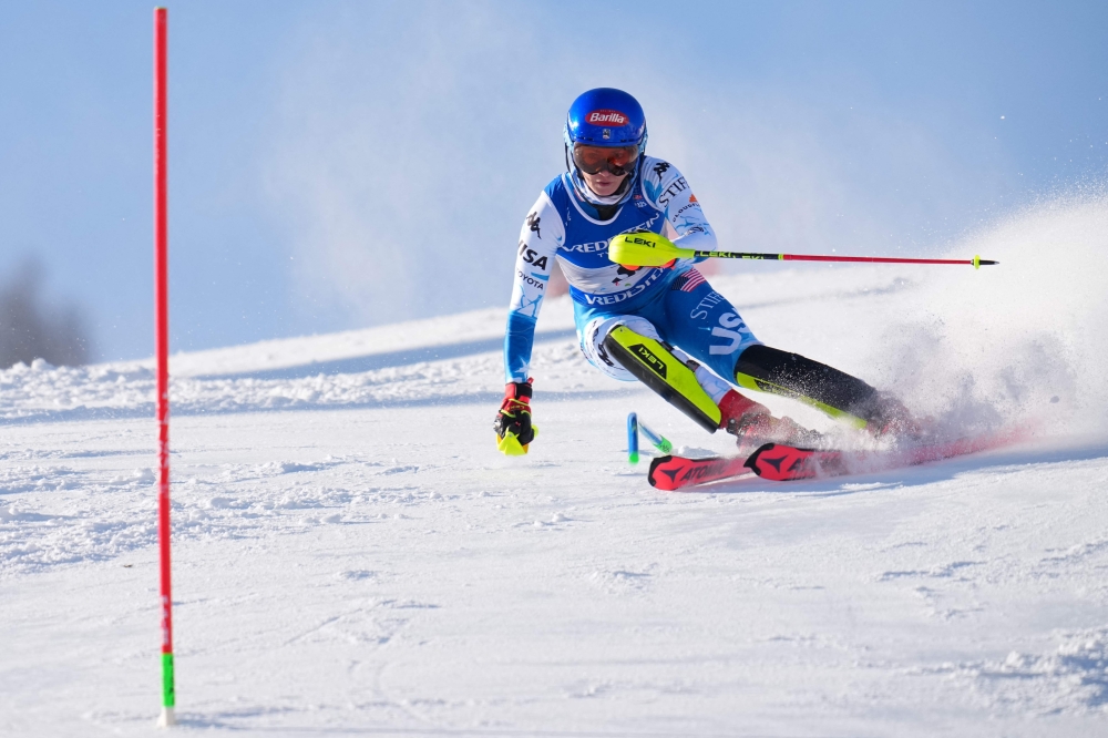 US' Mikaela Shiffrin competes in the first run of the Women's Slalom event of the Saalbach 2025 FIS Alpine World Ski Championships in Hinterglemm on February 15, 2025. (Photo by Dimitar Dilkoff / AFP)