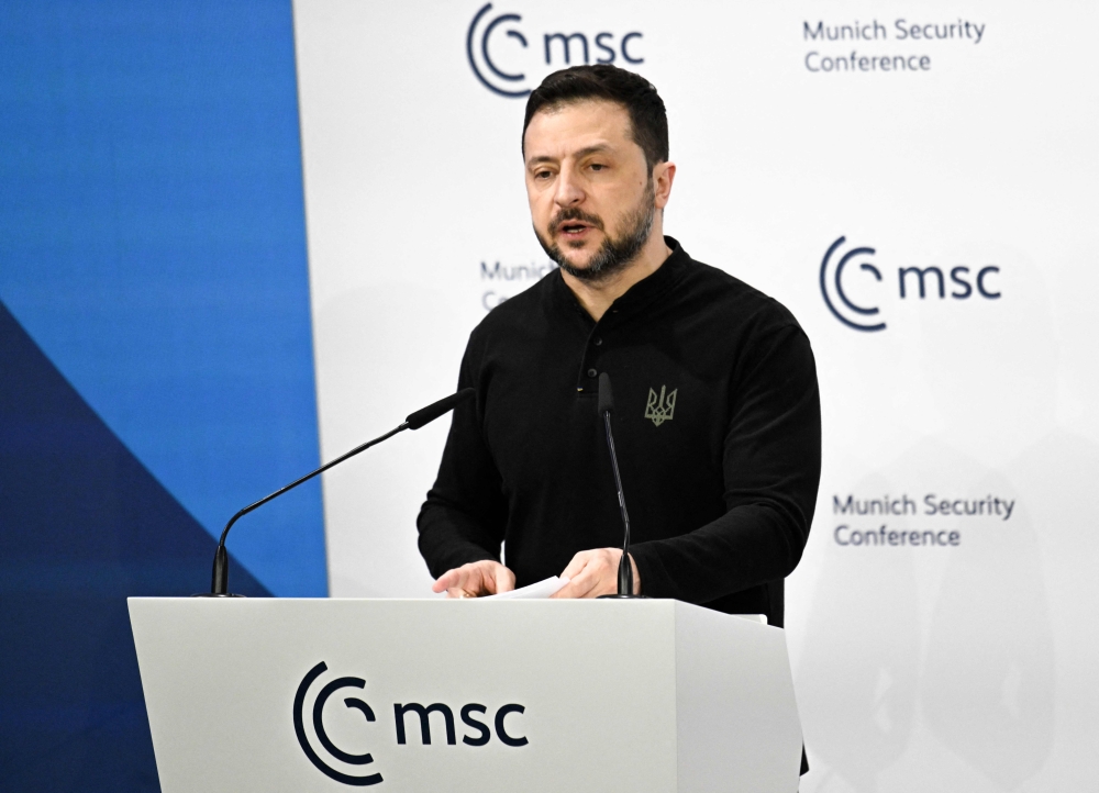 Ukrainian President Volodymyr Zelensky delivers a speech during the 61st Munich Security Conference (MSC) in Munich, southern Germany on February 15, 2025. (Photo by Thomas Kienzle / AFP)