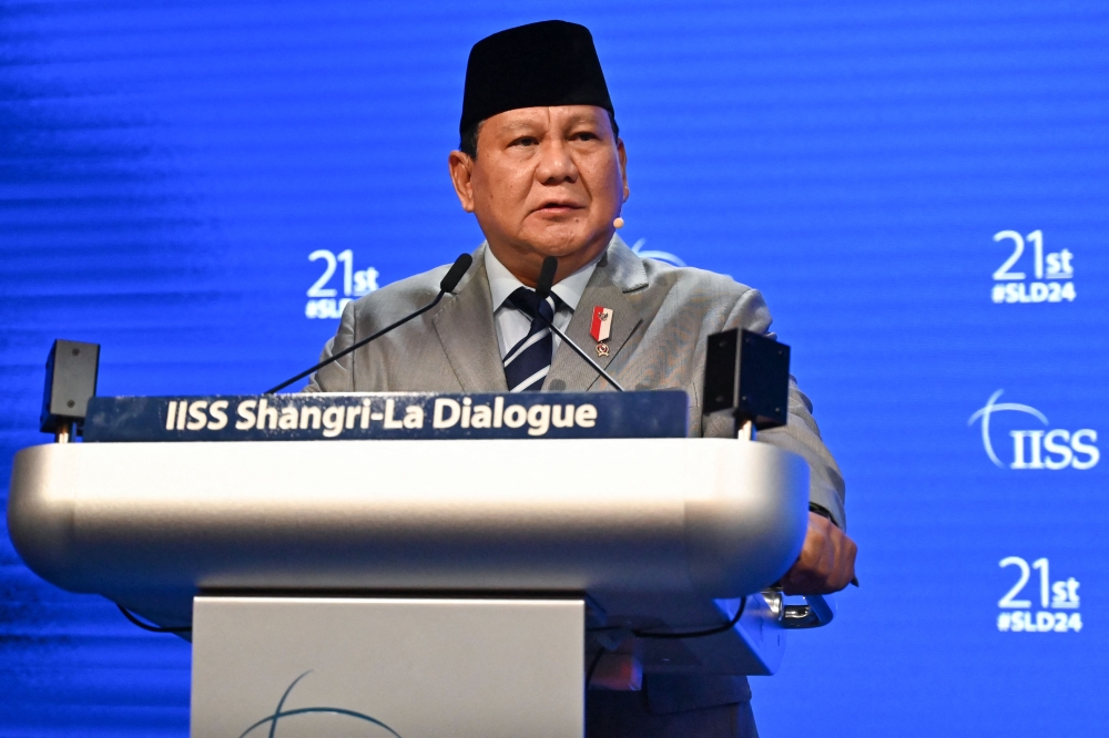 Indonesia's Defence Minister and president-elect Prabowo Subianto speaks during the 21st Shangri-La Dialogue summit in Singapore on June 1, 2024. (Photo by Nhac Nguyen / AFP)