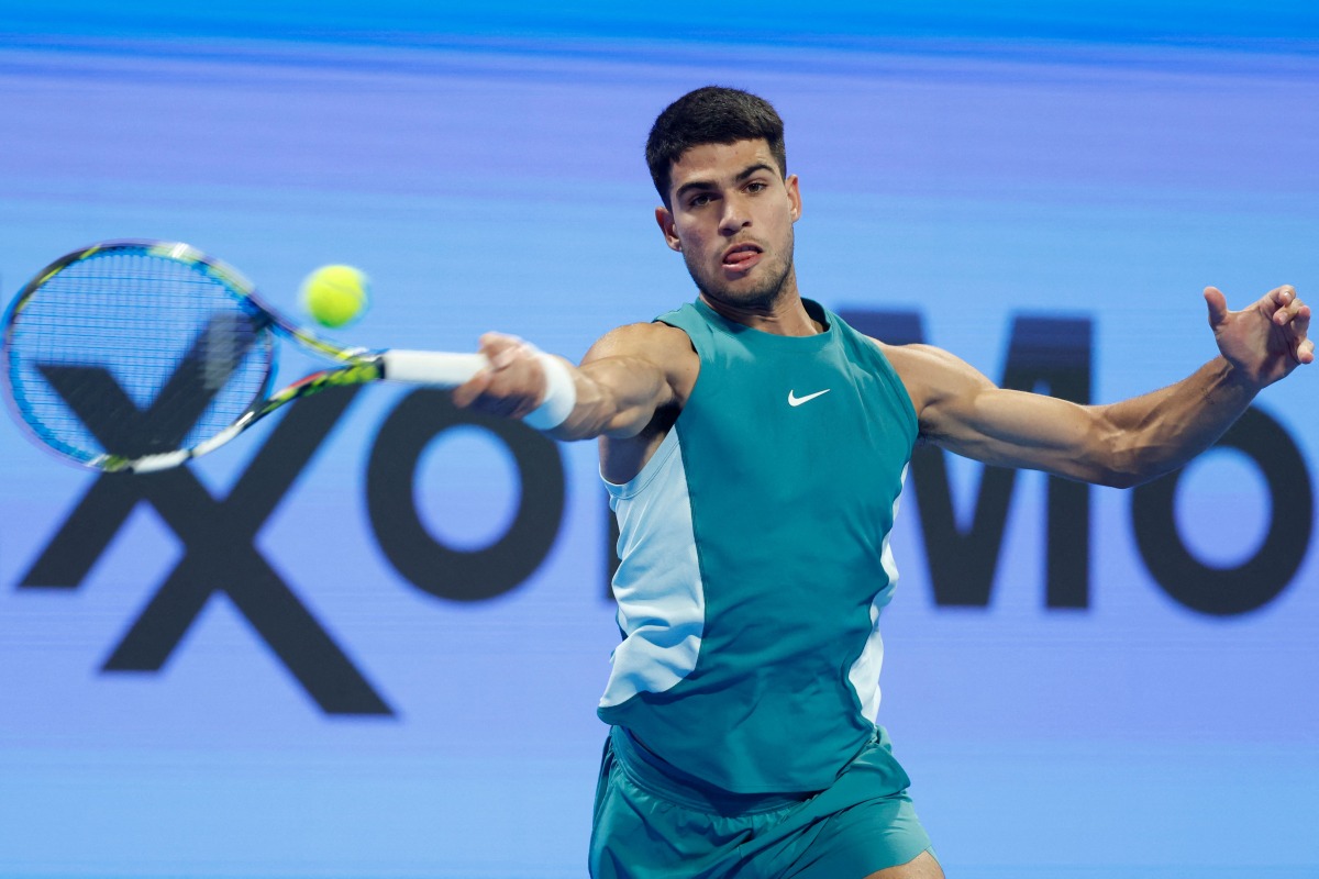 Spain’s Carlos Alcaraz returns the ball to Croatia’s Marin Cilic. AFP