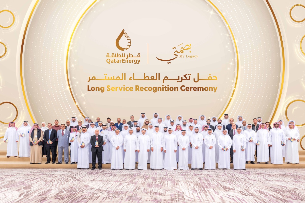 Minister of State for Energy Affairs and the President and CEO of QatarEnergy, H E Saad Sherida Al Kaabi with officials and employees at the 'My Legacy' recognition ceremony.