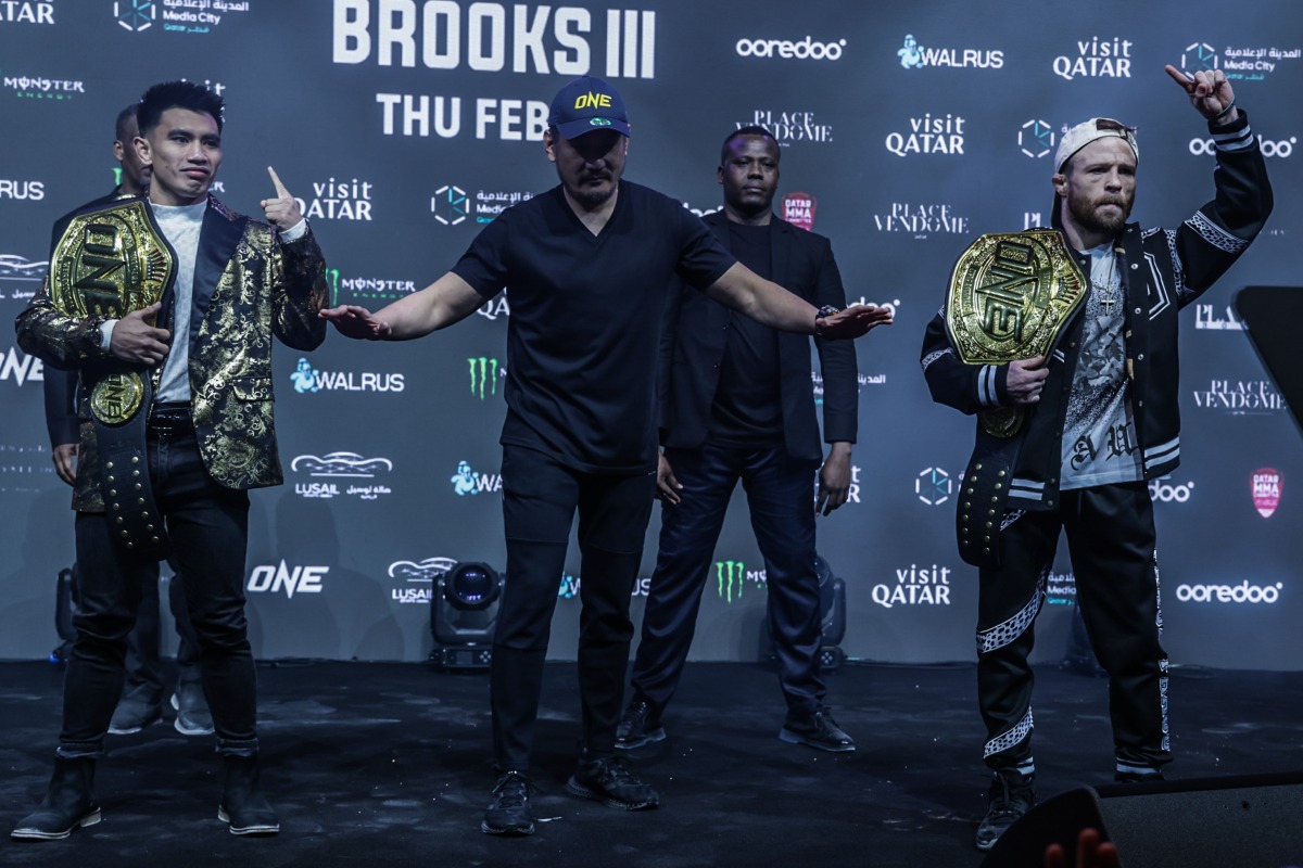 ONE Championship Chairman and CEO Chatri Sityodtong (centre) with Joshua Pacio (left) and Jarred Brooks.
