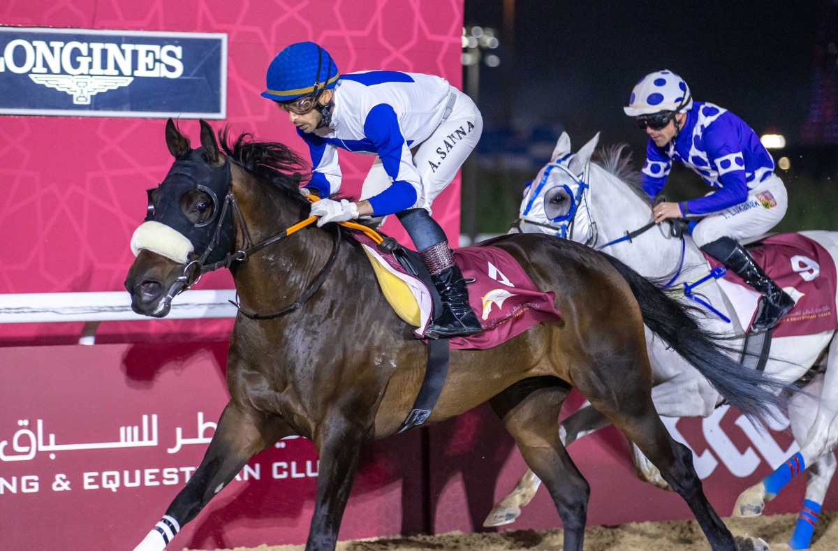 Jockey Alberto Sanna guides Al Maqam to victory. 