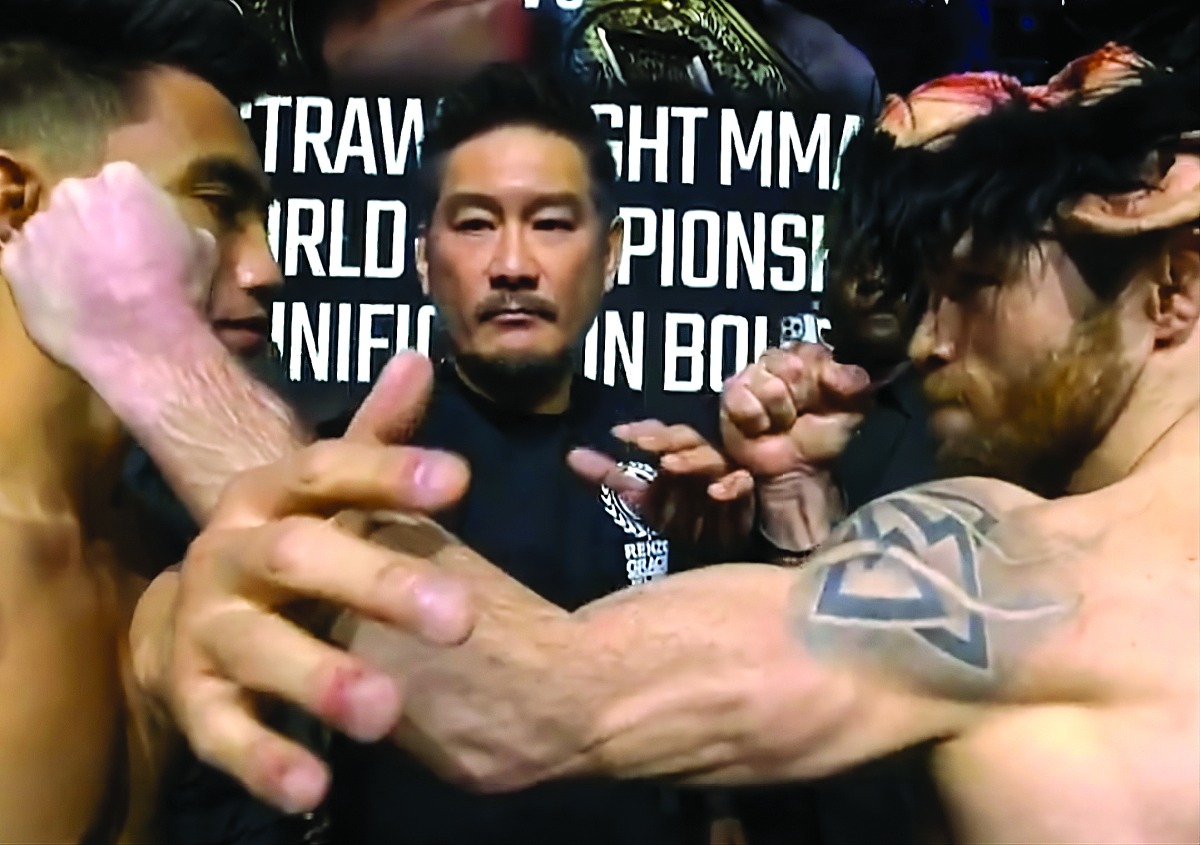 ONE Championship Chairman and CEO Chatri Sityodtong (centre) with Joshua Pacio (left) and Jarred Brooks after the ceremonial weigh-ins.
