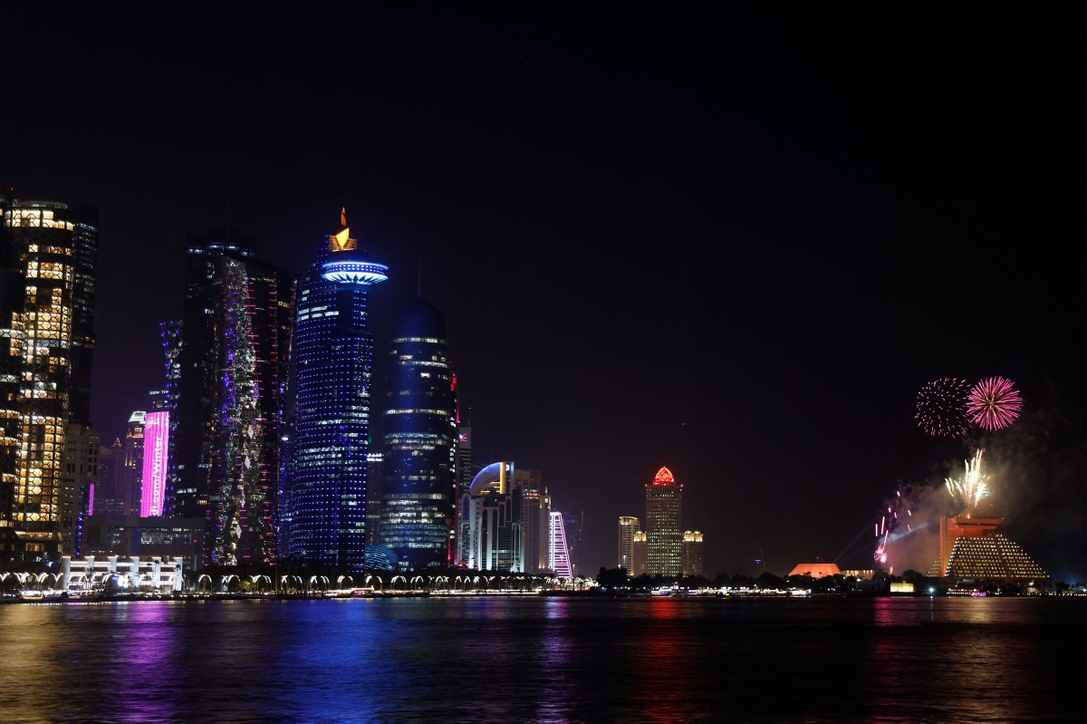 Fireworks light up the sky over the West Bay district in Doha on February 18, 2025. (Photo by KARIM JAAFAR / AFP)
