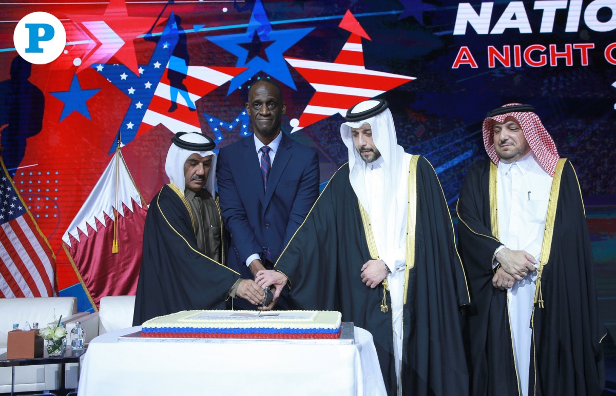 Minister of Public Health H E Mansoor bin Ebrahim Al Mahmoud (second right); MoFA Secretary General H E Dr. Ahmad Hassen Al Hammadi (left); Director of Protocol Department, MoFA, H E Ambassador  Ibrahim Yousif Abdullah Fakhro (right); and US Ambassador to Qatar H E Timmy Davis at the cake-cutting ceremony to mark 249th Anniversary of US Independence Day. Pic: Rajan Vadakkemuriyil/The Peninsula