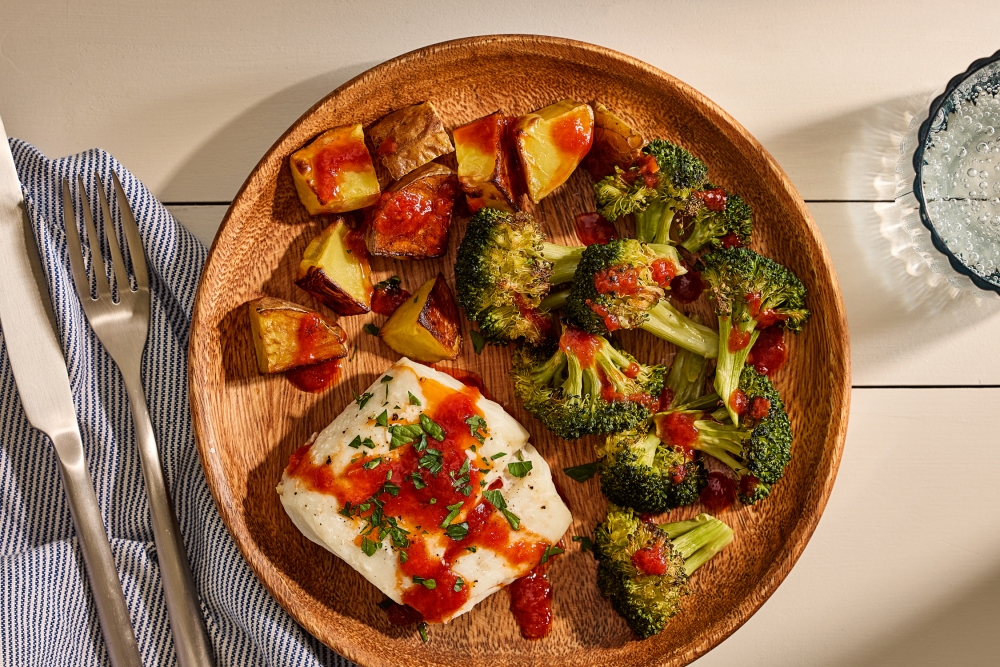 Sheet Pan Cod With Vegetables and Smoked Paprika Sauce. Tom McCorkle for The Washington Post/food styling by Gina Nistico for The Washington Post