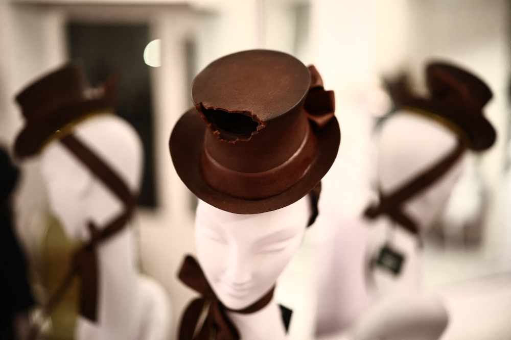 A hat made from tempered chocolate is seen on display as milliner Stephen Jones presents his Autumn-Winter 2025-2026 collection during London Fashion Week in London, on February 21, 2025. (Photo by Henry Nicholls / AFP)