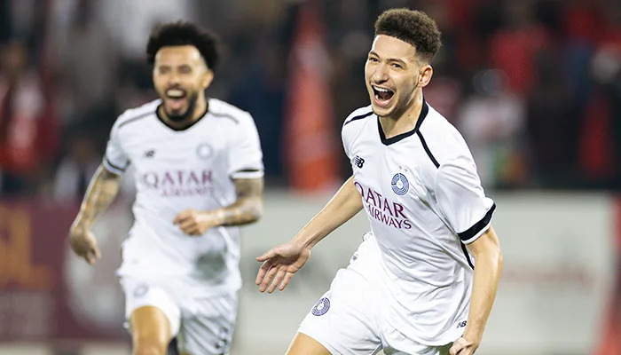 Al Sadd’s Mostafa Mashaal celebrates after scoring his team’s opening goal against Al Duhail.