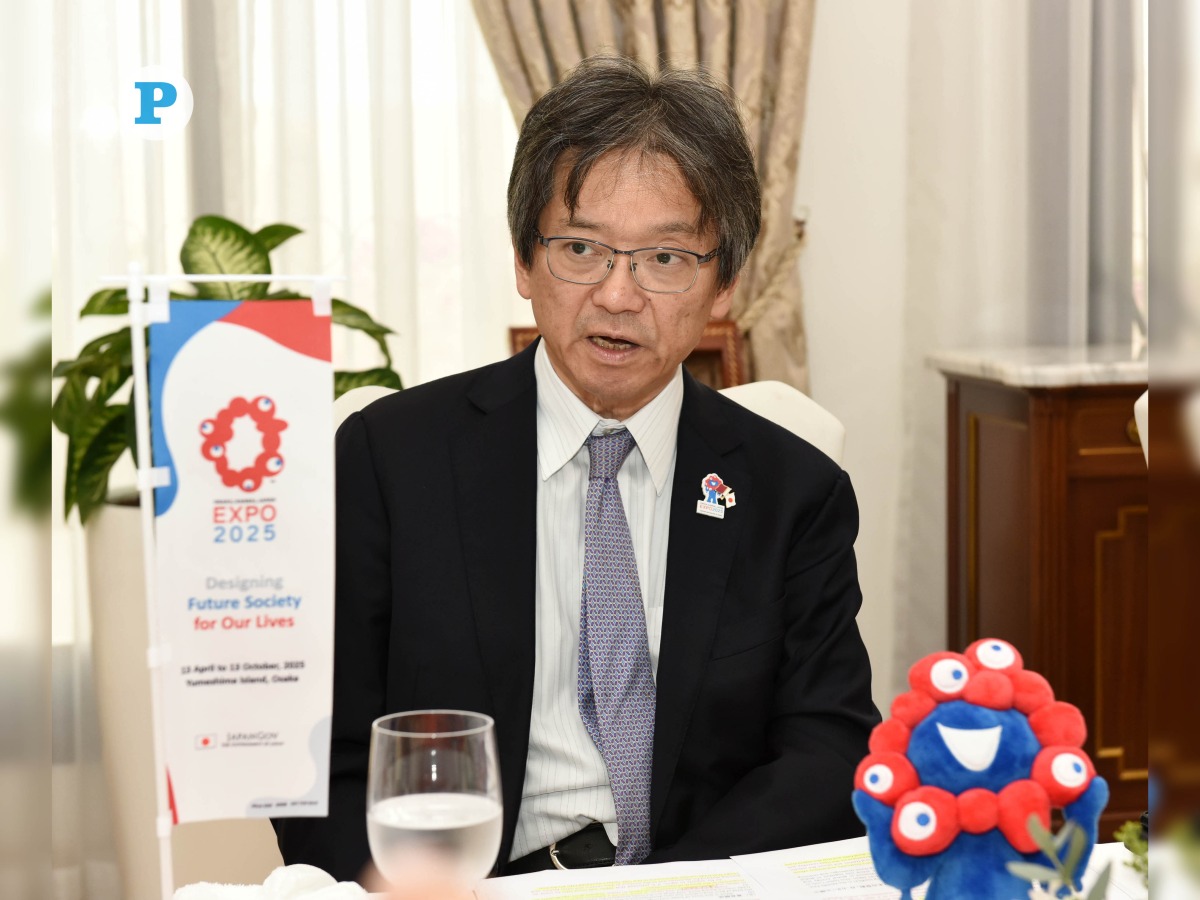 Ambassador Naoto Hisajima with Expo 2025 mascot “Myaku-Myaku” during the press conference.  Pic: Salim Matramkot/The Peninsula 