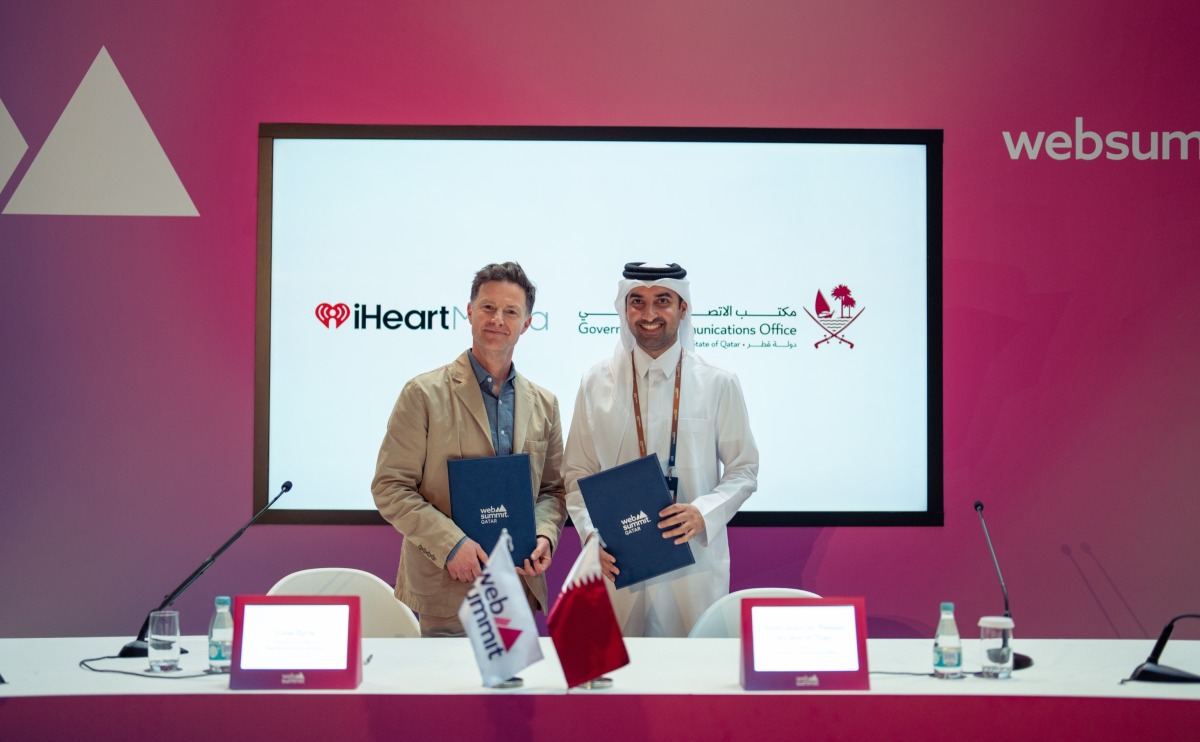 GCO Director and Chairman of the Permanent Web Summit Organizing Committee H E Sheikh Jassim bin Mansour bin Jabor Al Thani with iHeart official at the signing ceremony.