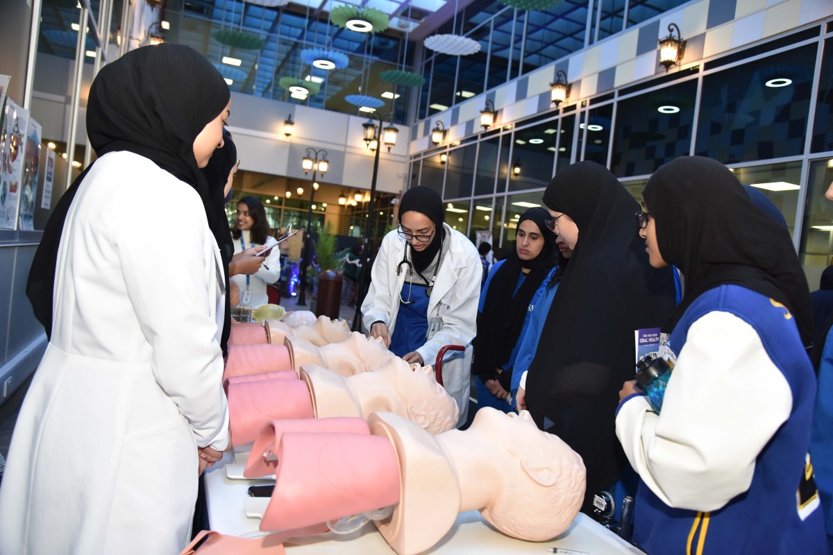 Students showcasing skills needed for health professionals during the event.