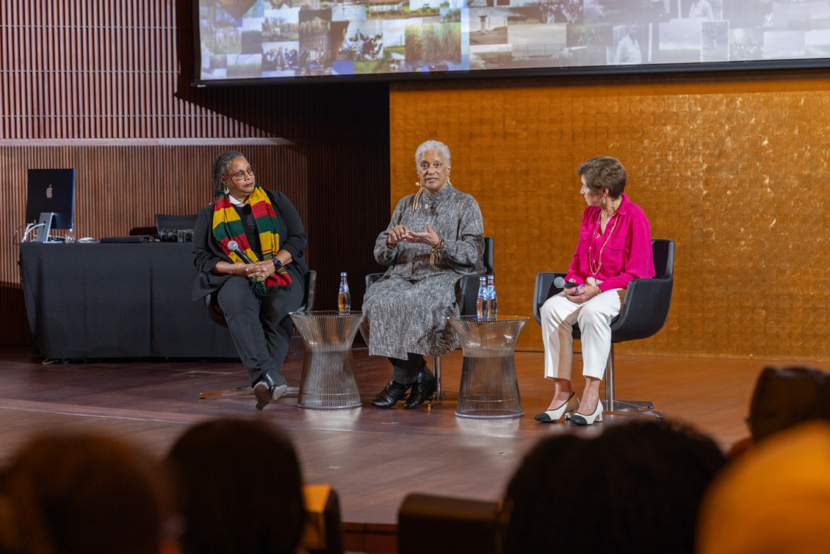 Mélisande Short-Colomb and others speak at the event at GU-Q.