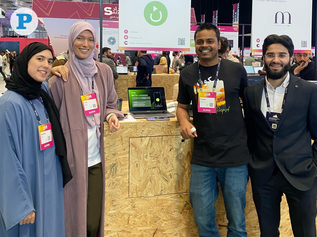 Nasheedio CEO Lucy Amanda (second left) with the team at Web Summit Qatar 2025.