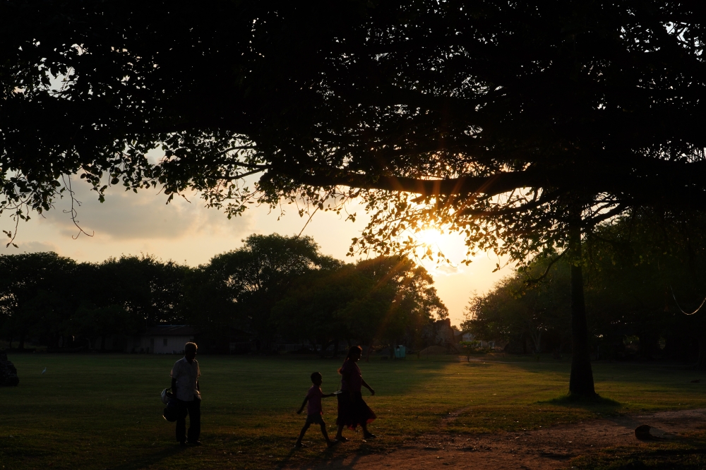 Citizens take a walk inside the Jaffna Fort in Jaffna, Sri Lanka, on February 23, 2025. (Xinhua/Chen Dongshu)