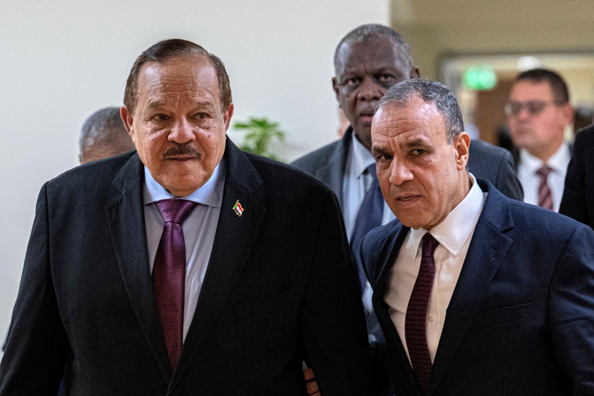 Egypt's Foreign Minister Badr Abdelatty (R) receives Sudan's Foreign Minister Ali Yousuf al-Sharif for a meeting at the New Administrative Capital, about 45 kilometres east of Cairo, on February 23, 2025. (Photo by Khaled DESOUKI / AFP)
