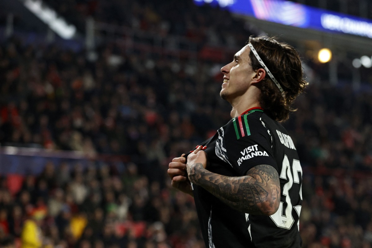 Arsenal's Italian defender #33 Riccardo Calafiori celebrates scoring his team's seventh goal during the UEFA Champions League round of 16 first leg football match between PSV Eindhoven (NED) and Arsenal FC (ENG) at the the PSV Stadion, in Eindhoven, on March 4, 2025. (Photo by MAURICE VAN STEEN / ANP / AFP) / Netherlands OUT
