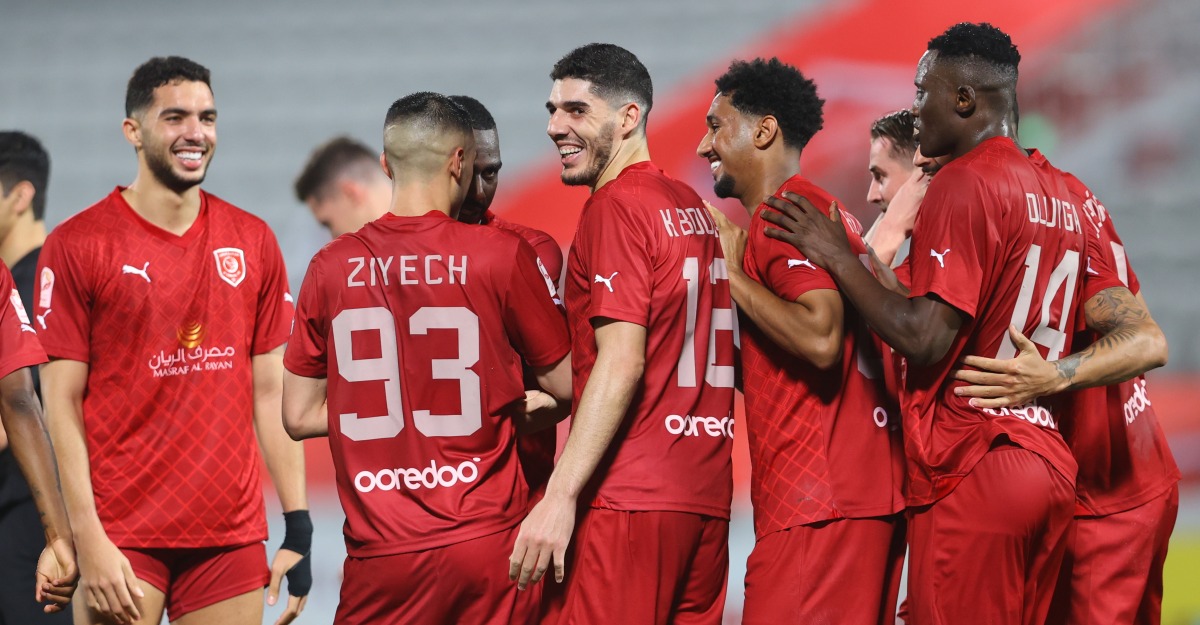 Al Duhail players celebrate during the match.