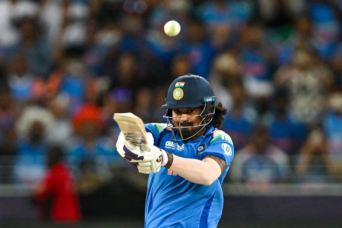 India's KL Rahul plays a shot during the ICC Champions Trophy one-day international (ODI) final cricket match in Dubai on March 9, 2025. (Photo by Ryan Lim / AFP)
