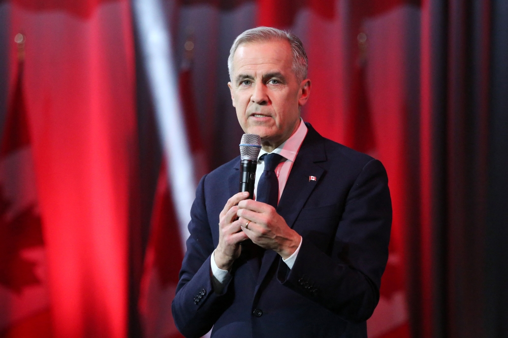 Canada's Liberal Leader and Prime Minister-elect Mark Carney speaks after being elected as the new Liberal Party leader, in Ottawa on March 9, 2025. (Photo by Dave Chan / AFP)